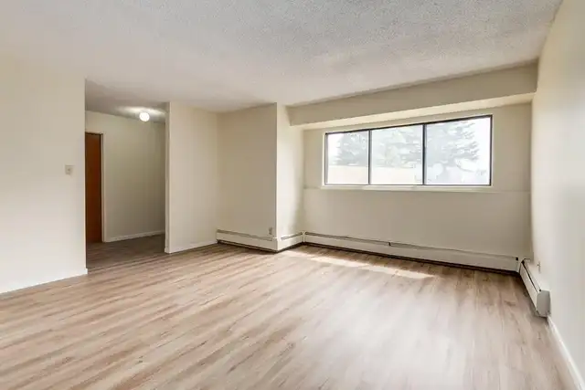 Enjoy the on-site playground and outside green spaces | Perfect  in Long Term Rentals in Edmonton - Image 7