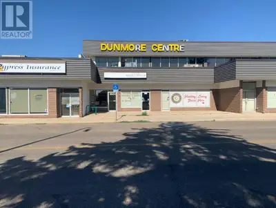 Centrally located second floor office space. This space has 3 good sized offices, all with large win...