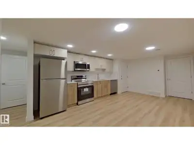 This home features: • Full kitchen with dishwasher and stainless steel appliances • Cozy carpet in t...