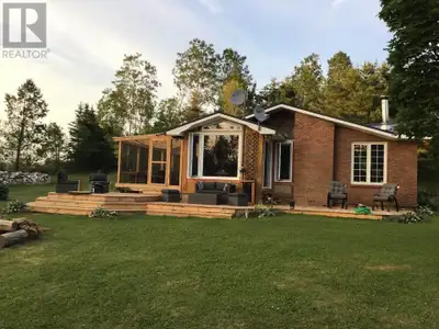 2878 Douses Road is truly an exceptional property offering waterfront views, 5 acres of beautifully...