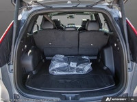 Explore the elegance and capability of the 2026 Honda CR-V Hybrid Touring AWD, draped in a sophistic... (image 6)