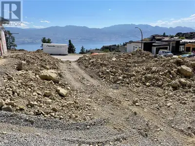 LOT WITH A LOT! All preliminary work has been done including beautiful house plans & designs, buildi...