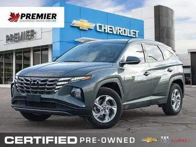 The expansive panoramic sunroof of this 2023 Hyundai Tucson Preferred offers breathtaking views, tra...