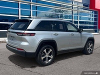 2.0L I4 DOHC, 4WD. Odometer is 18677 kilometers below market average! Silver Zynith 2023 Jeep Grand... (image 5)