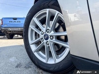 Efficient, practical, and well-equipped. The 2017 Ford Focus SE FWD is designed to keep every drive... (image 9)