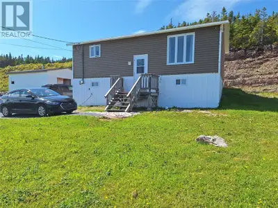 Nestled on a 1.24-acre hillside lot in the scenic municipality of Cape St. George, this split-level...