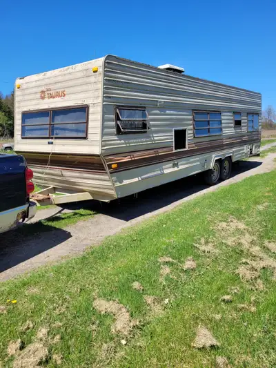 30 FT TANDEM AXEL TAURUS CAMPING TRAILER , MOSTLY GUTED EXCEPT FOR SOME CUPBOARDS , ALL THE HARD WOR...