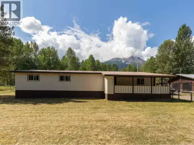5 beds, 1 bath on a beautiful 5 acre lot, minutes from Smithers. This home consists of a 1975 manufa...