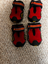 Red Ruffwear Dog Boots with rubber soles Size M