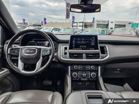 This 2021 GMC Yukon SLT is powered by a robust 5.3L V8 engine paired with a refined 10-speed automat... (image 9)