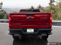 Command attention and conquer any task with this striking Radiant Red Tintcoat 2025 Chevrolet Silver... (image 3)