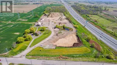 Seller Retiring Live + Work opportunity featuring 13.8 acres with direct Highway 407 exposure and co...