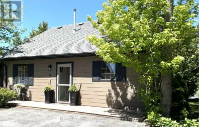 Escape to this charming 3-bedroom year-round cottage retreat with peaceful pond views, mature trees,...