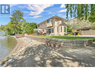 Introducing a once-in-a-lifetime opportunity to own ~100 feet of prime sandy lakefront on the pristi...