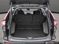 Embrace the road in style with the 2026 Honda CR-V Sport AWD, a dynamic black beauty designed for ad... (image 6)
