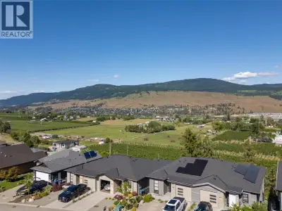 Discover the perfect blend of comfort and luxury in this beautifully appointed half-duplex walk-out...