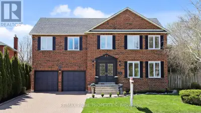 63 Reeve Drive isn't just a home, it's a statement in Markham Villages most exclusive enclave. Behin...
