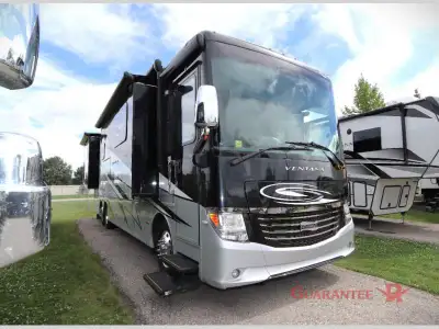 Guarantee RV Calgary's LARGEST selection of pre-owned inventory. The 2017 Newmar Ventana 4037 is a 4...