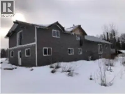 FORECLOSURE, PRICED $240,000 BELOW TAX ASSESSEMENT! Located 7 km south of Mackenzie, BC, 13145 Highw...
