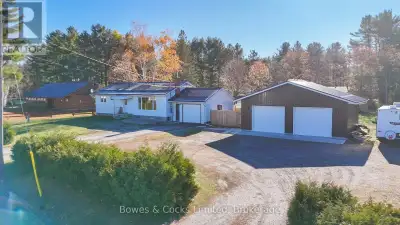 Welcome to 159 South Baptiste Lake Rd - A beautifully updated home on a double lot just minutes from...