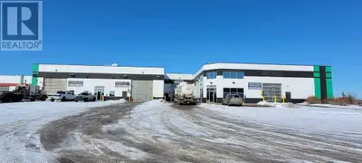 * A STATE OF THE ART TRUCK WASH WITH 3 WAND WASH TRUCK BAYS(2 bays with 150 foot length and 1 bay wi...