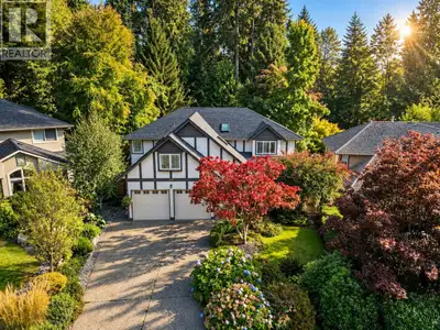 A rare family home offering exceptional space, privacy & a park-like setting in one of North Vancouv...