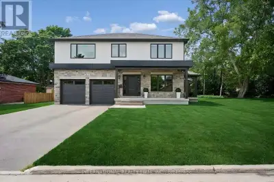 Exceptional Custom-Built Home (2024) in Burlington's Desirable Central Neighbourhood. Nestled on a q...