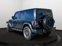 This Jeep Wrangler has a strong Gas/Electric V-6 3.6 L/220 engine powering this Automatic transmissi... (image 3)