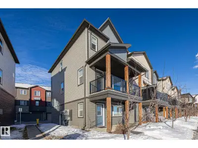 Discover modern industrial living in this stunning 1,544 sq. ft. end-unit townhouse in the beautiful...