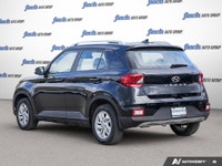 Discover the 2020 Hyundai Venue Preferred: a sleek, black subcompact SUV designed for urban adventur... (image 2)