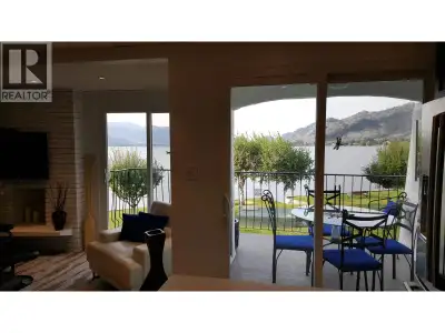 Waterfront living with stunning panoramic views and exceptional value. Beautifully renovated in 2018...