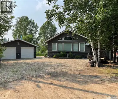 Experience year-round lakefront living at its finest with this beautiful waterfront retreat near Emm...