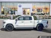 Dominate every journey and make a powerful statement in this striking 2022 Ram 1500 Sport Crew Cab.... (image 1)