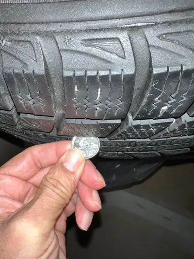 Size- 225/65 R17 Winter tires in V good condition With steel rims