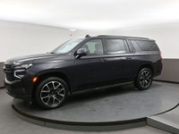 The 2023 Chevrolet Suburban RST blends full-size SUV capability with a bold, sporty edge. Powered by... (image 2)