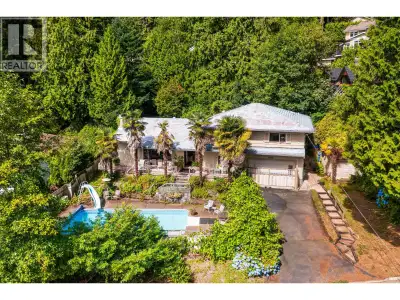Opportunity awaits on this impressive 14,200 sq. ft. lot with 100' of frontage in sought-after Upper...