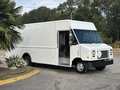 This 2018 Ford E-450 is powered by a V8 gasoline engine paired with an automatic transmission and re...