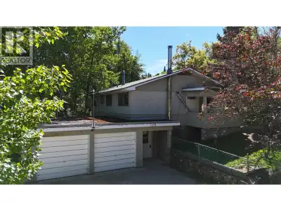Opportunity awaits on this larger 3-bedroom, 2-bathroom home set across three city lots. Featuring a...