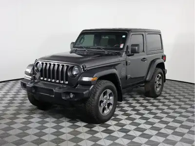 Step into our 2022 Jeep Wrangler Sport 2 Door 4X4 in Granite Crystal Metallic, and start your next g...