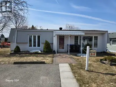 Retirement living in Sandycove Acres. Pride of ownership, beautifully maintained with neutral colors...