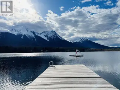 Enjoy the lakeside lifestyle with beautiful mountain views from this building lot, located in Watson...