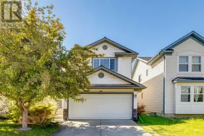 Located on a sunny South backing lot on a quiet street in McKenzie Towne, this property offers over...