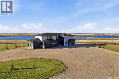 Located 30 minutes east of Saskatoon, this exceptional 2021 custom-built two-storey home spans over...
