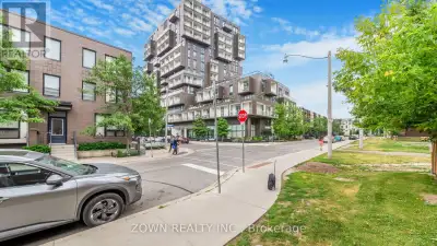 Welcome to this beautifully designed 2-bedroom, 2-bathroom corner suite at the prestigious Tridel SQ...