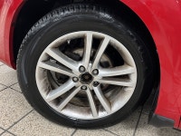 A red 2011 Dodge Avenger SXT easing through the day has a way of making routine driving feel more de... (image 8)