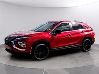 The 2026 Mitsubishi Eclipse Cross NOIR S-AWC, clad in a striking red exterior, combines the robust h... (image 2)