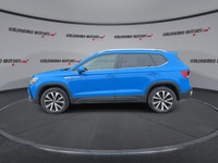 // ACCIDENT FREE!! // Finished in Blue with a Black interior, this 2023 Volkswagen Taos Comfortline... (image 4)
