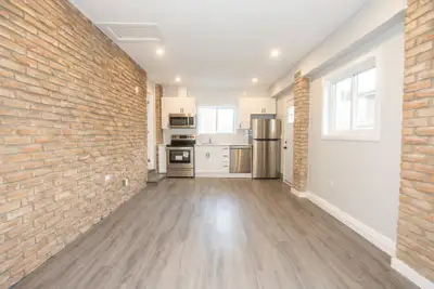 APARTMENT FOR RENT!! This unit offers a gorgeous open-concept kitchen with, high-end stainless steel...