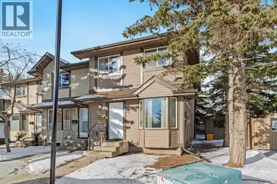 Presenting 49 Range Gardens NW, a well-maintained end-unit townhouse in the sought-after community o...