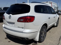 Enjoy class and comfort in a WHITE Buick Enclave. Buick introduced the Enclave at the 2006 Detroit A... (image 4)